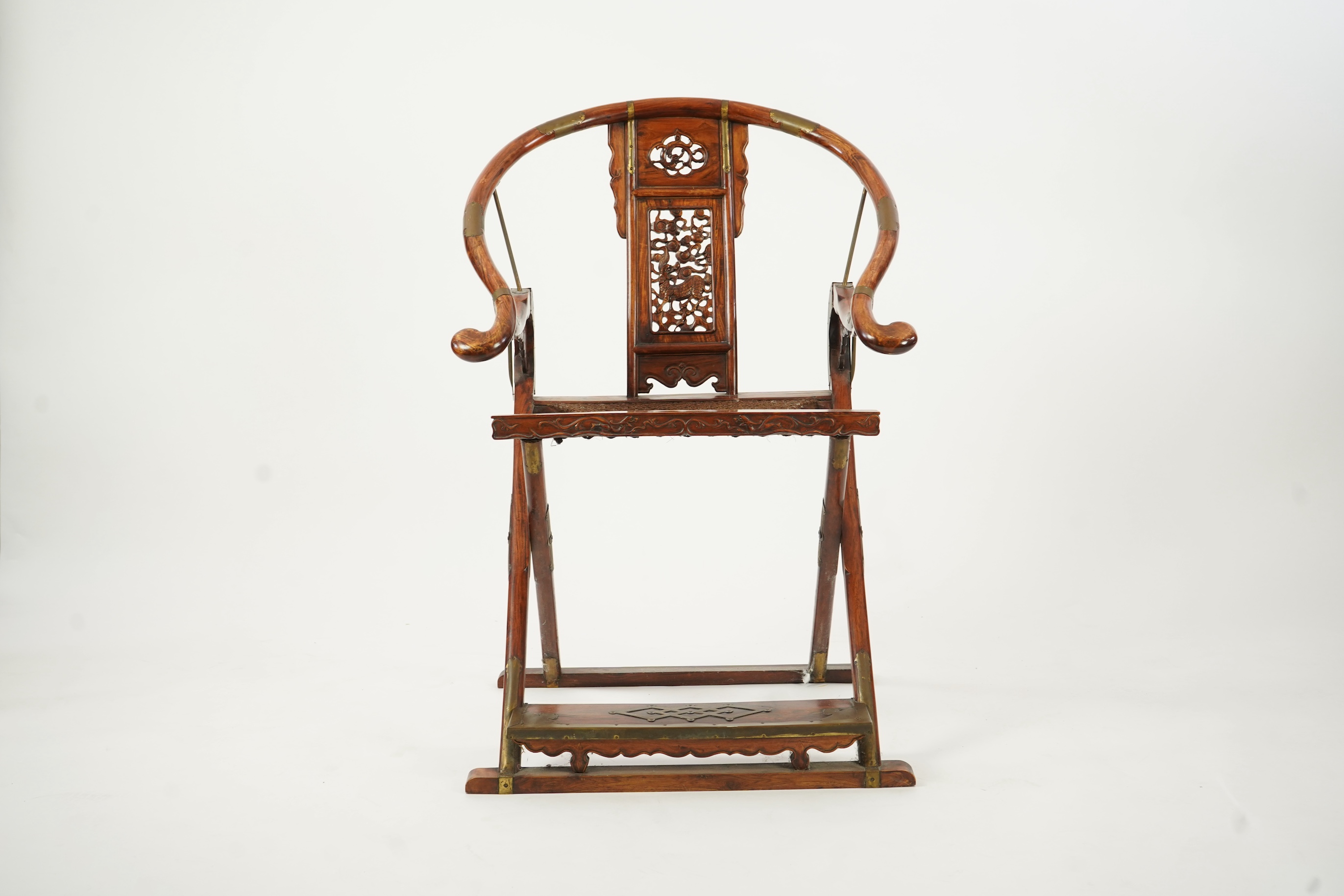 A Chinese huanghuali, hongmu and brass mounted folding hunting chair, jiaoyi, early 20th century